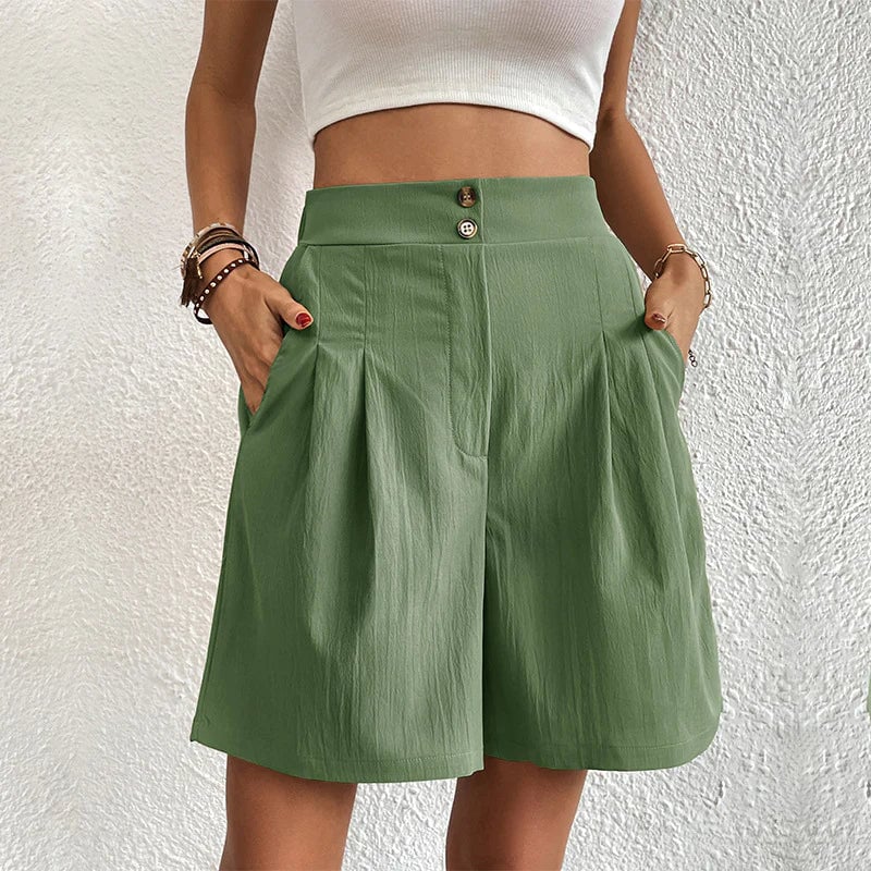 Full-length view of women's stylish shorts paired with sandals
