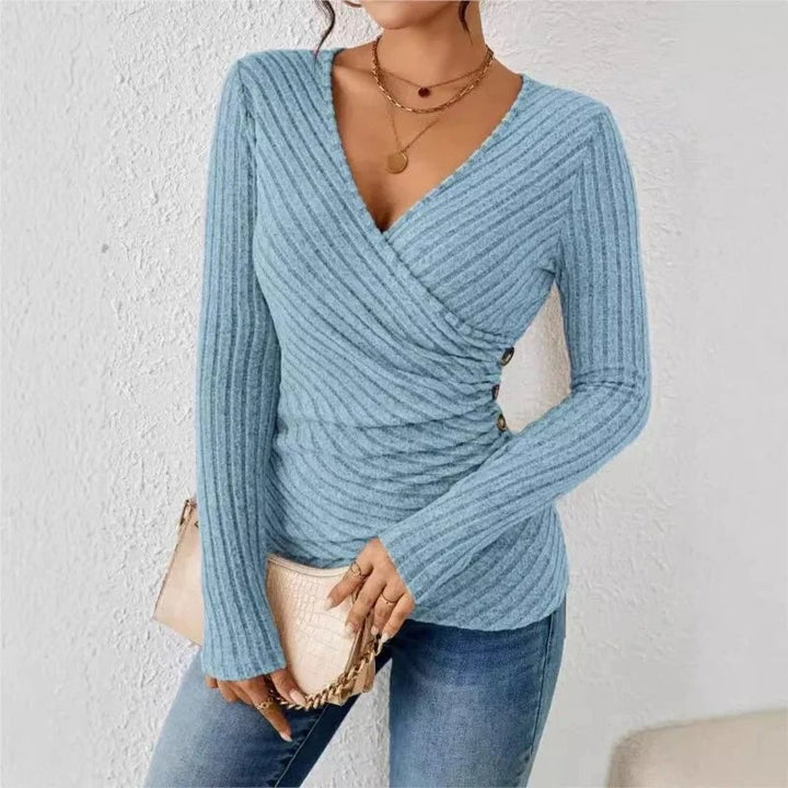 Side profile view of the tummy-tucking long sleeve top highlighting the midsection-smoothing fit
