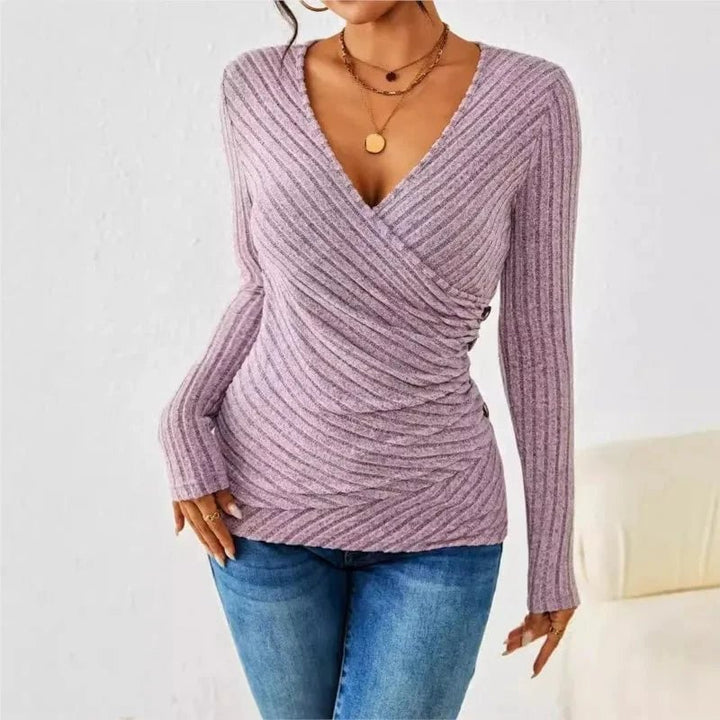 Flat lay of the long sleeve shaping top in violet showing overall length and sleeve detail