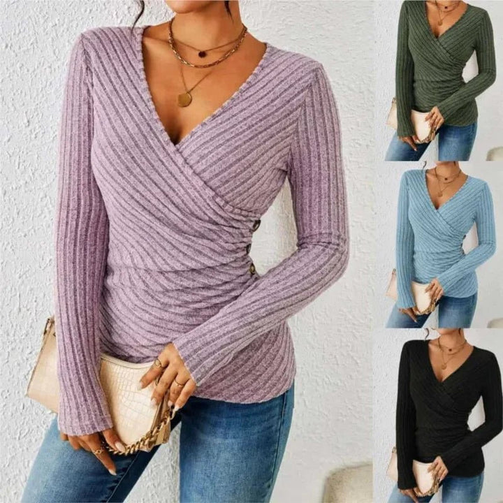 Back view of the long sleeve V-neck top in black showing clean lines and relaxed fit