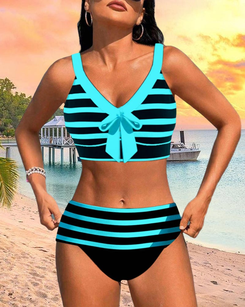 Close-up of pink stripe pattern and high waist bottom on Caroline bikini