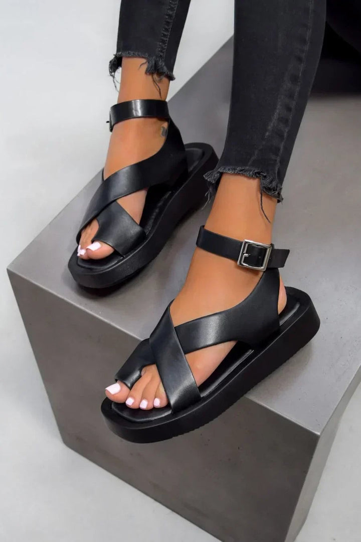 Caroline women's platform buckle sandals in orange, front three-quarter view