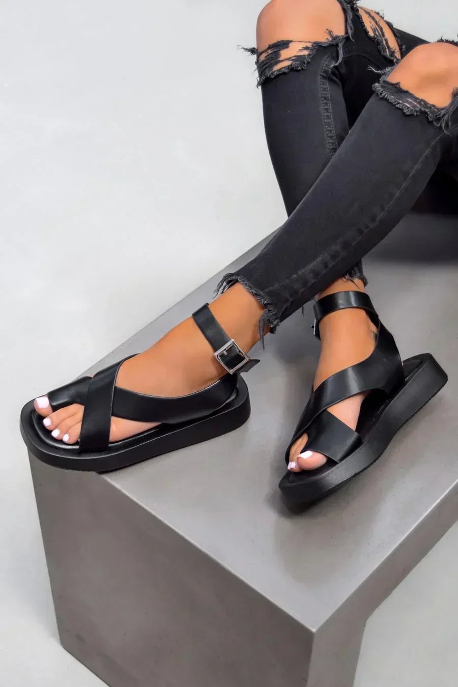 Caroline platform sandals in beige displayed on a neutral background, side profile