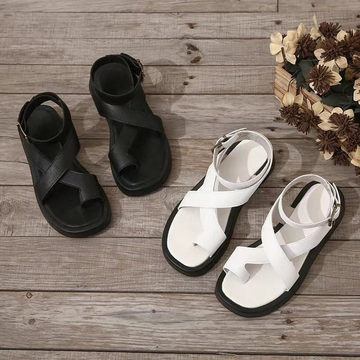 Pair of Caroline platform sandals in beige and white side by side showing color options
