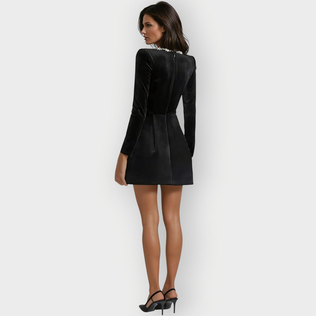 Front view of velvet mini dress highlighting the flattering square neckline and mini length