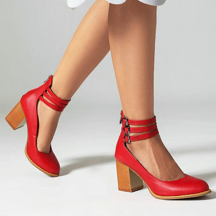 Casilda white block heel sandal with ankle strap, side profile view
