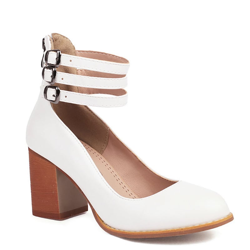 Casilda brown sandal detail shot highlighting smooth finish and clean silhouette