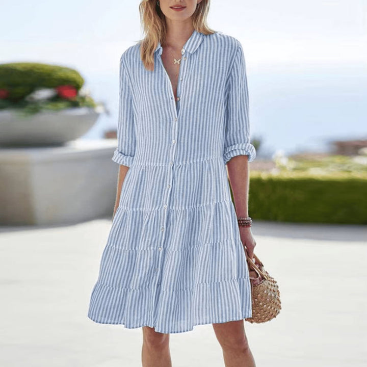 Side view of the Cassandra breezy striped dress showing flared A-line hem and relaxed fit