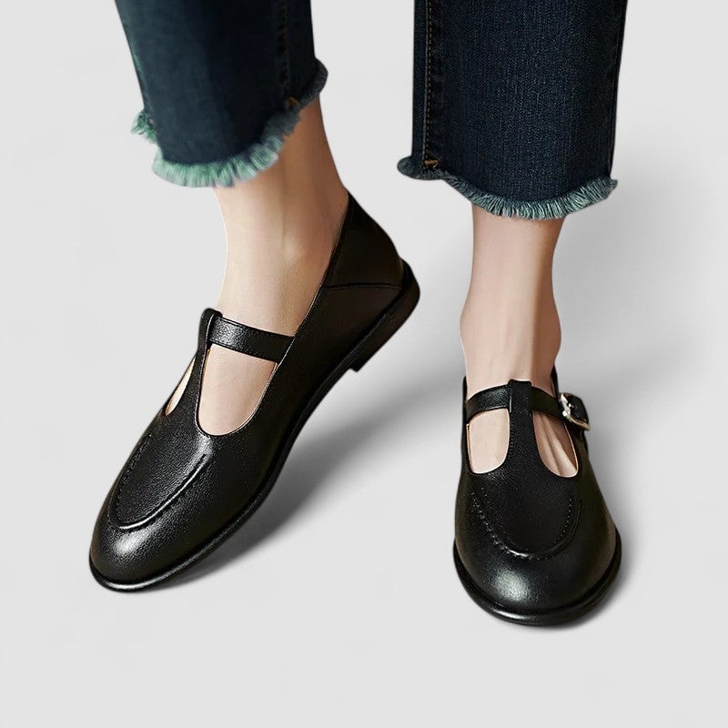 Cassandra orthopedic low heel shoe in black shown from a front three-quarter angle