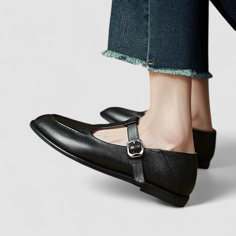 Side profile view of the Cassandra low heel shoe showing the supportive sole and heel height