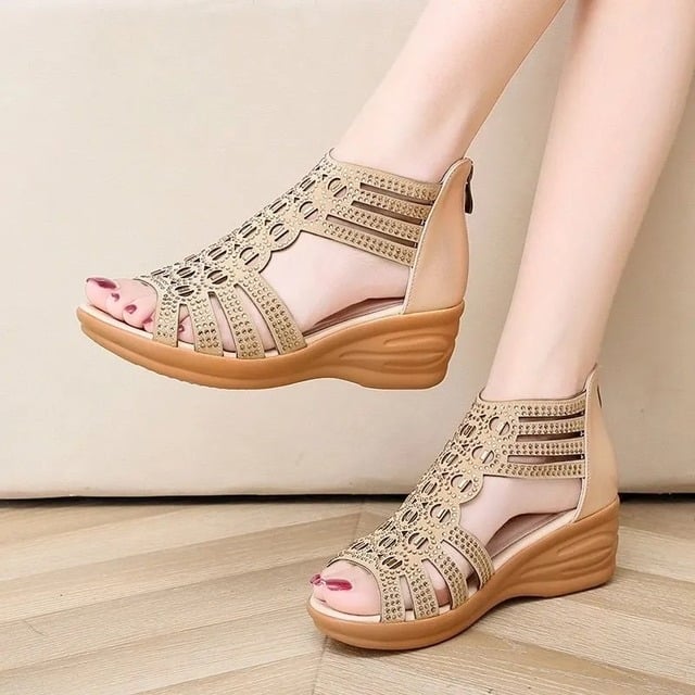 Cassandra women's adjustable sandals in beige shown from a three-quarter angle highlighting strap detail