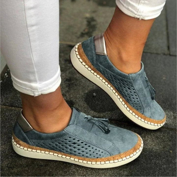 Side profile of the Cassandra slip-on sneaker highlighting the cushioned sole and flexible upper