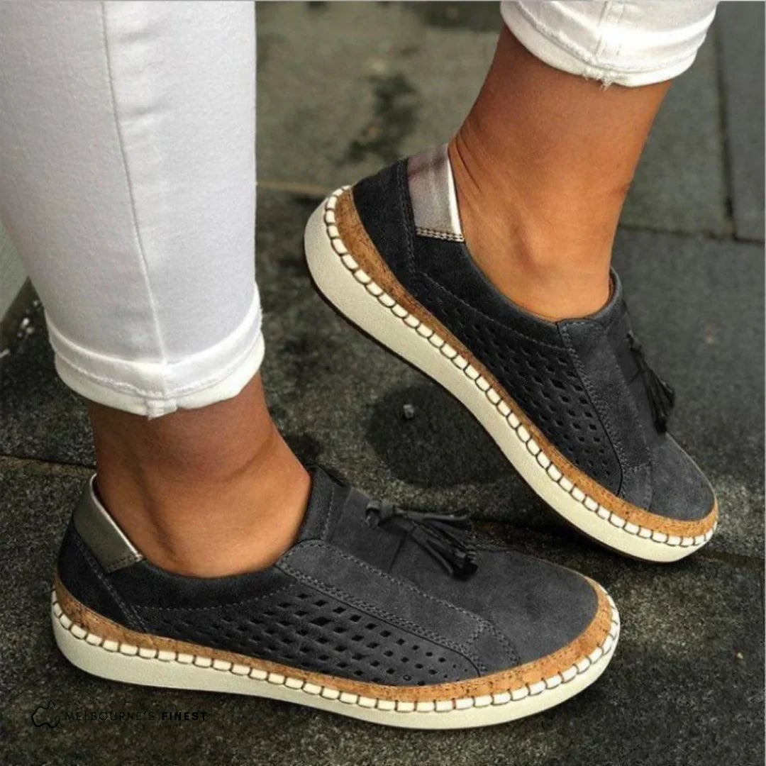 Top-down view of the Cassandra orthopedic sneaker showing the breathable interior and memory foam insole