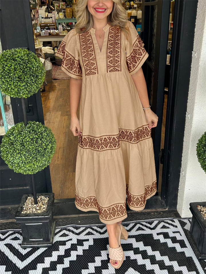 Side view of the Cassandra boho flowy dress in mocha, highlighting relaxed drape
