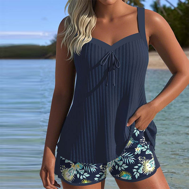 Front view of the Cassandra women's striped tummy control tankini set in Navy Blue with matching beach shorts