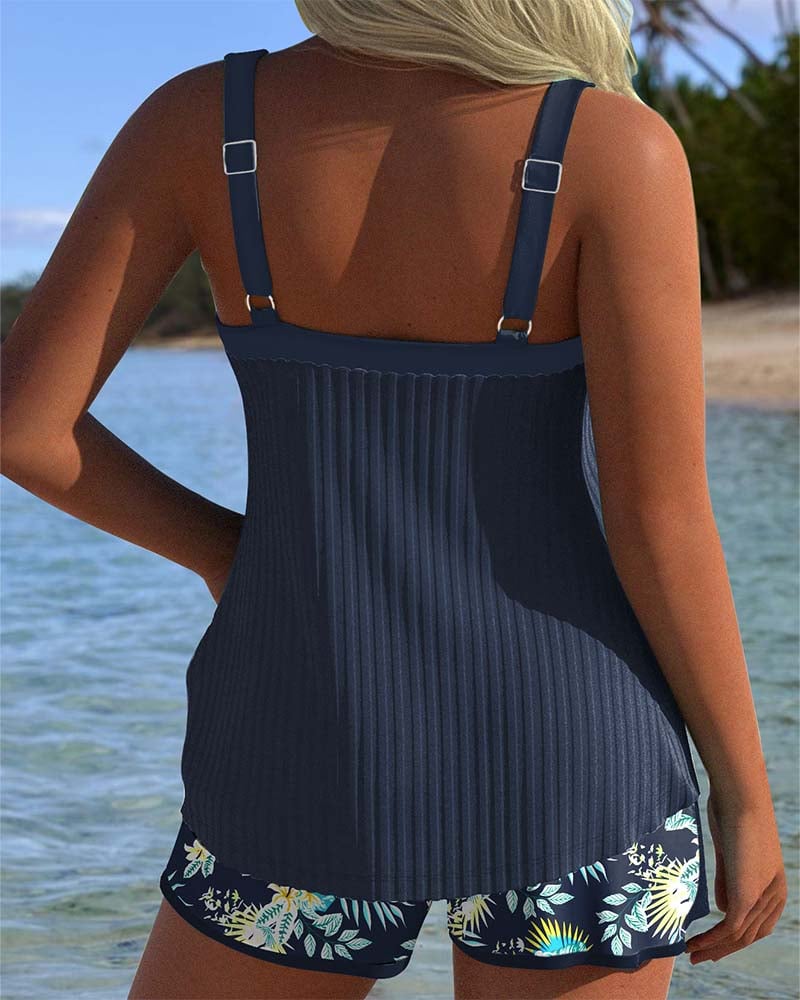 Back view of the Cassandra striped tankini top and beach shorts in Navy Blue showing supportive strap design