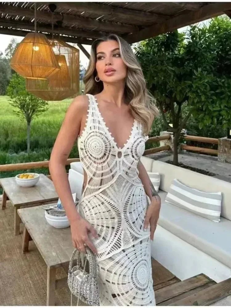 Front view of the Cassandra white wrap dress showing the neckline and shoulder design