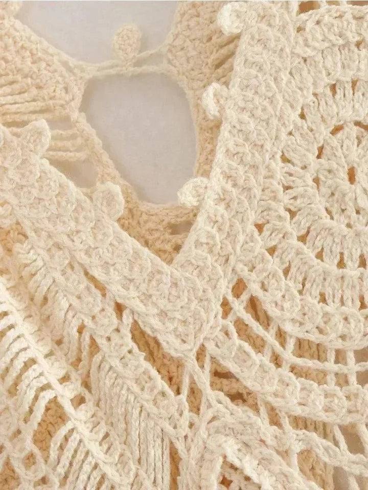 Close-up detail of the Cassandra white wrap dress fabric and elegant wrap tie