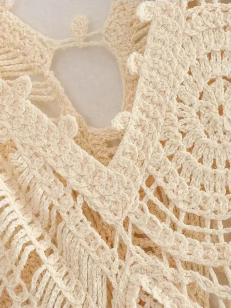Close-up detail of the Cassandra white wrap dress fabric and elegant wrap tie