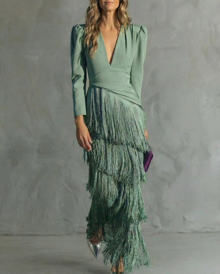 Cassiopeia V neck fringe maxi dress in green with tiered fringe skirt and long sleeves, front view