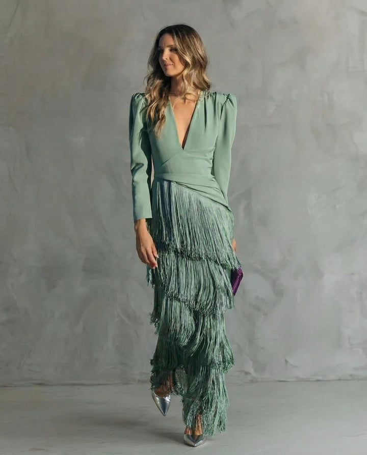 Cassiopeia fringe maxi dress in blue showing movement of tiered fringe skirt, front view