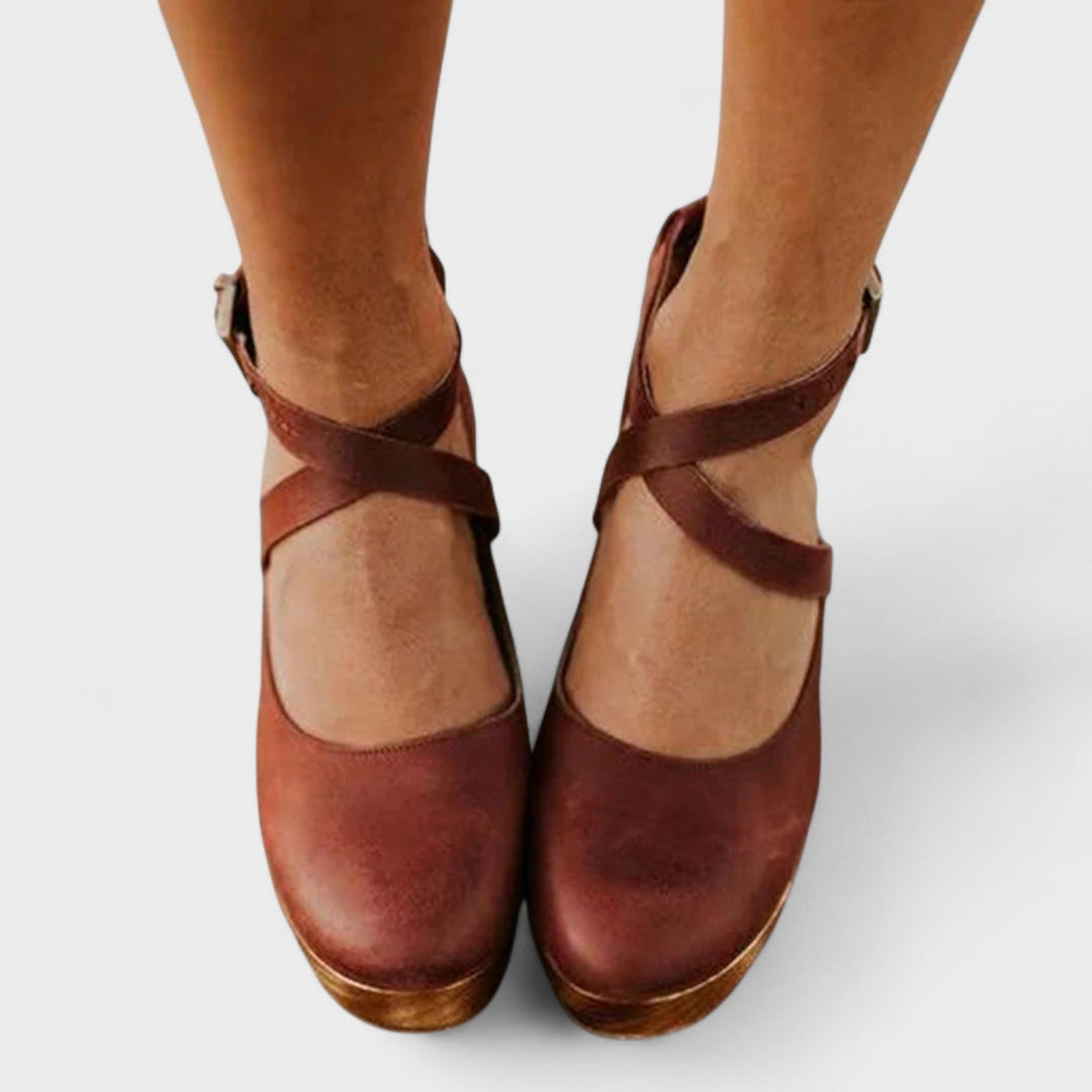 Side view of Catalina orthopedic flat sandal showing gently curved heel and strap detail