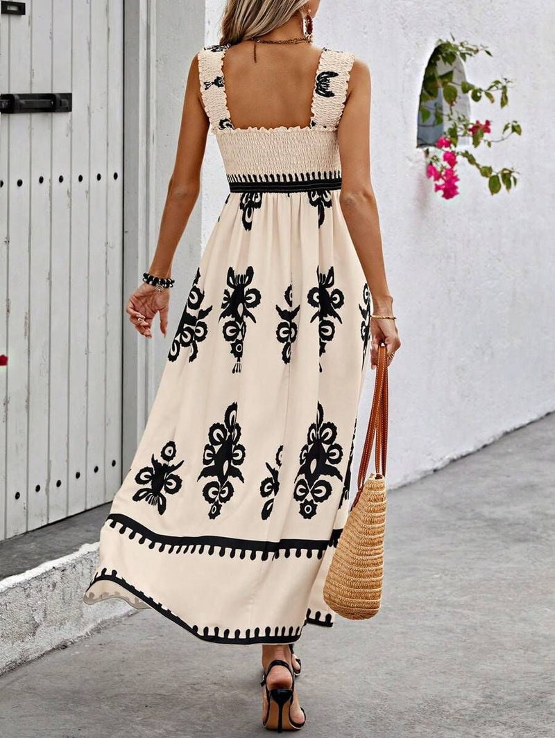 Front view of the Catalina printed square neck dress in cream showing the flowing silhouette