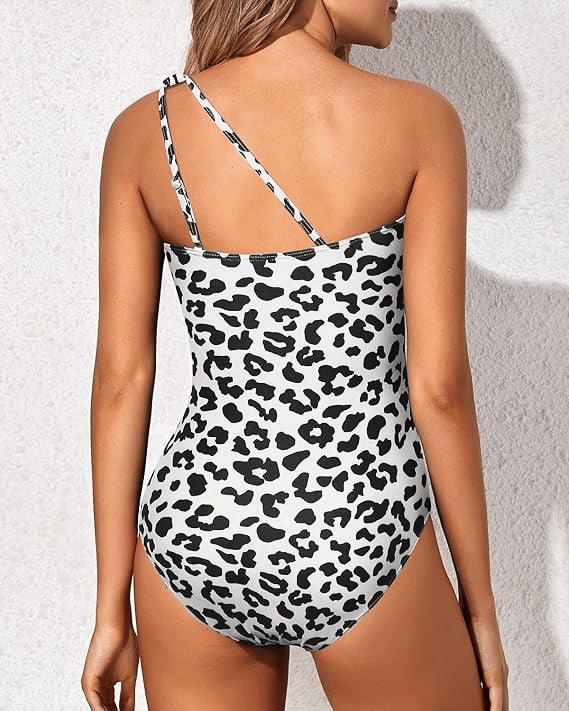 Side view of Catalina black swimsuit highlighting the asymmetrical one-shoulder silhouette
