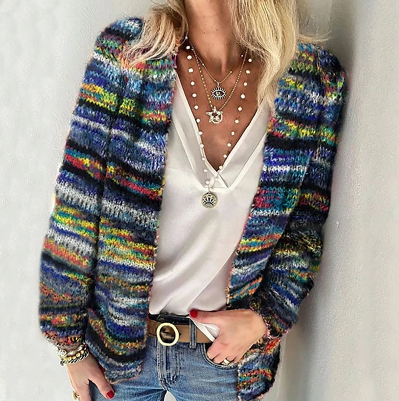 Close-up front view of a soft multicolor open-front cardigan in vibrant autumn colors
