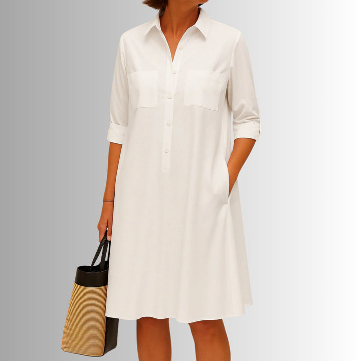 Close-up of the chic front button detail and modern collar on the lightweight A-line button dress