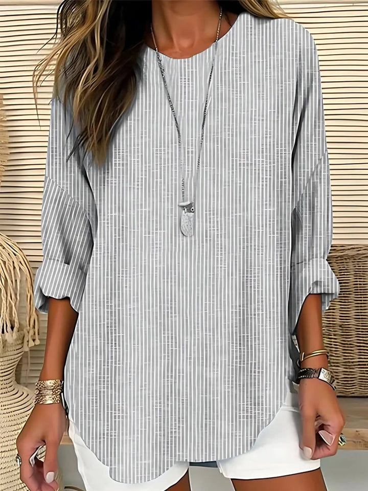 Close-up of the striped pattern on the Florimay Cecilia blouse in a neutral colorway