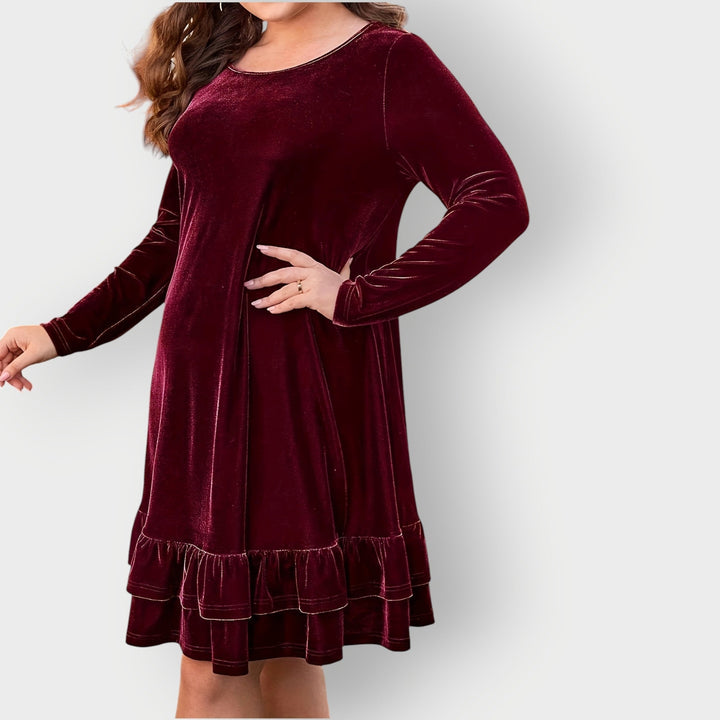 Model wearing the Celeste Classic Midi Dress in red, showing the flowing silhouette and midi length from the front