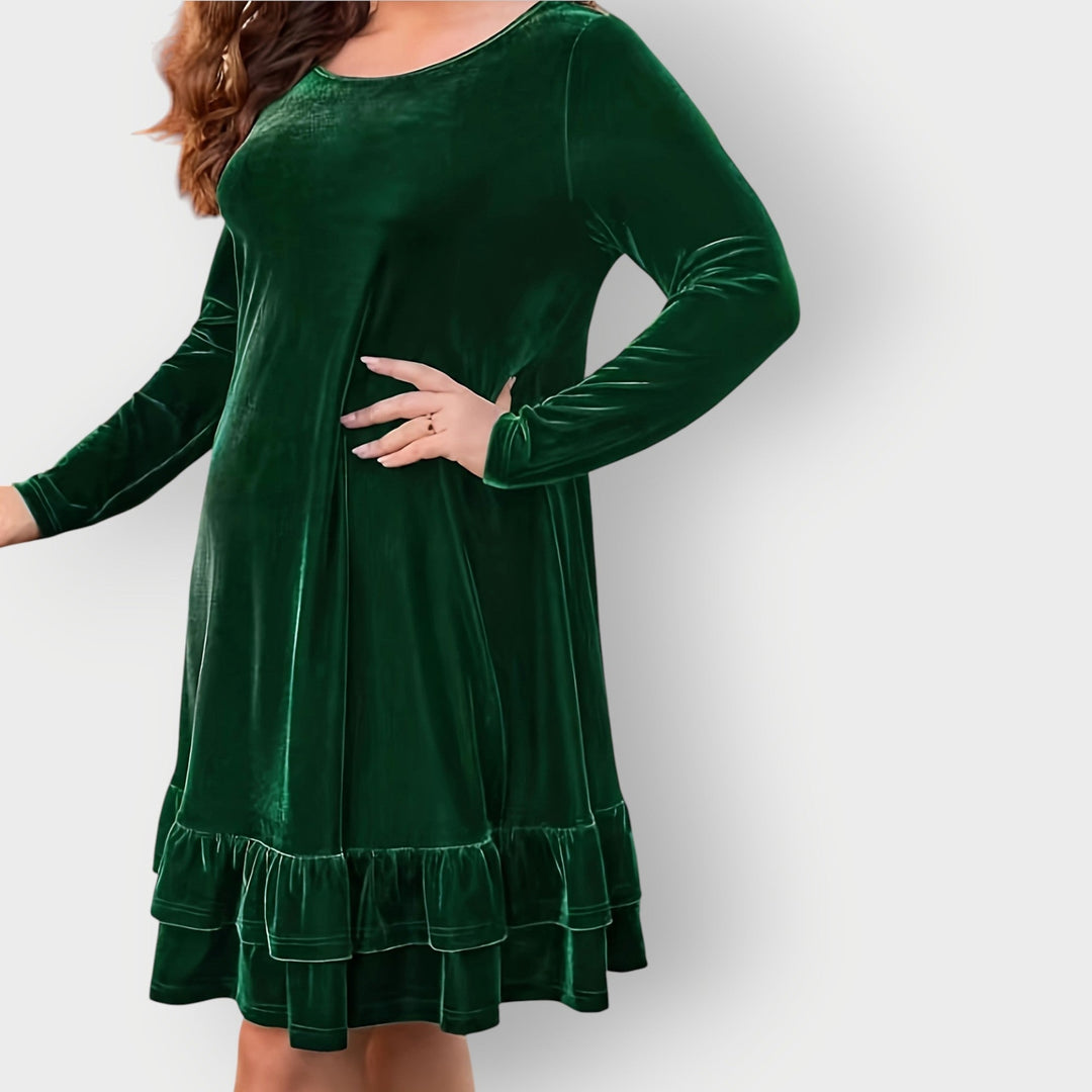 Close-up of the Celeste Classic Midi Dress fabric drape and waist-defining fit in a rich solid color