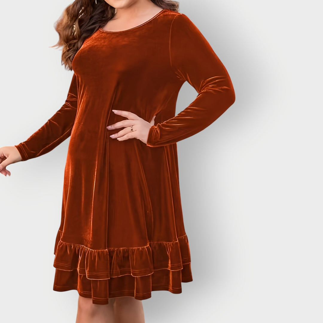 Full-length view of the Celeste Classic Midi Dress styled with heels, highlighting the elongating midi cut
