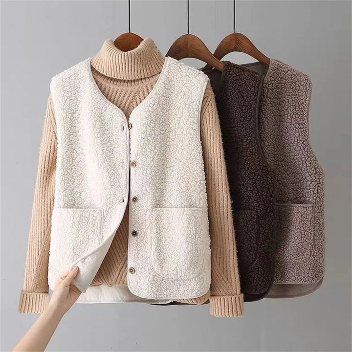 Woman wearing the Celeste soft comfort vest in beige teddy blend with buttoned front