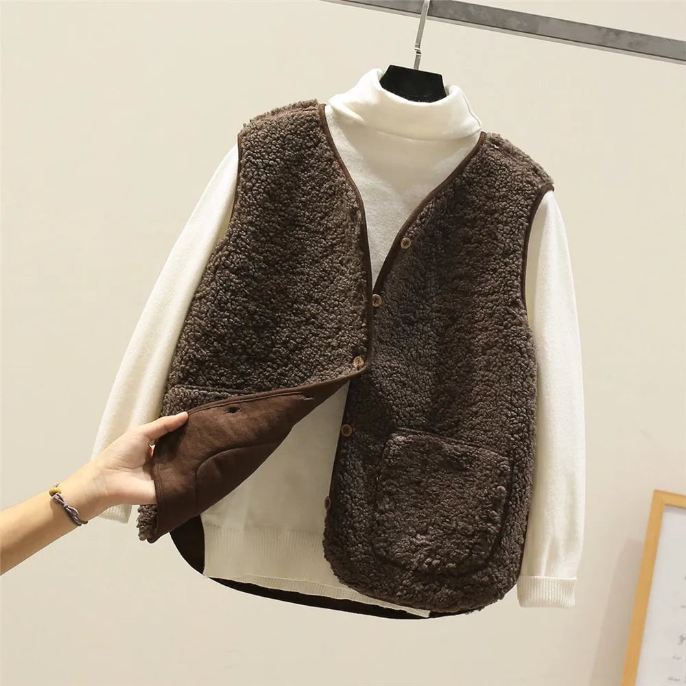 Detail shot of the front button closure on the Celeste soft comfort vest in khaki