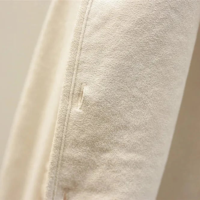 Overhead flat lay of the Celeste soft comfort vest in three colorways: beige, brown, and khaki