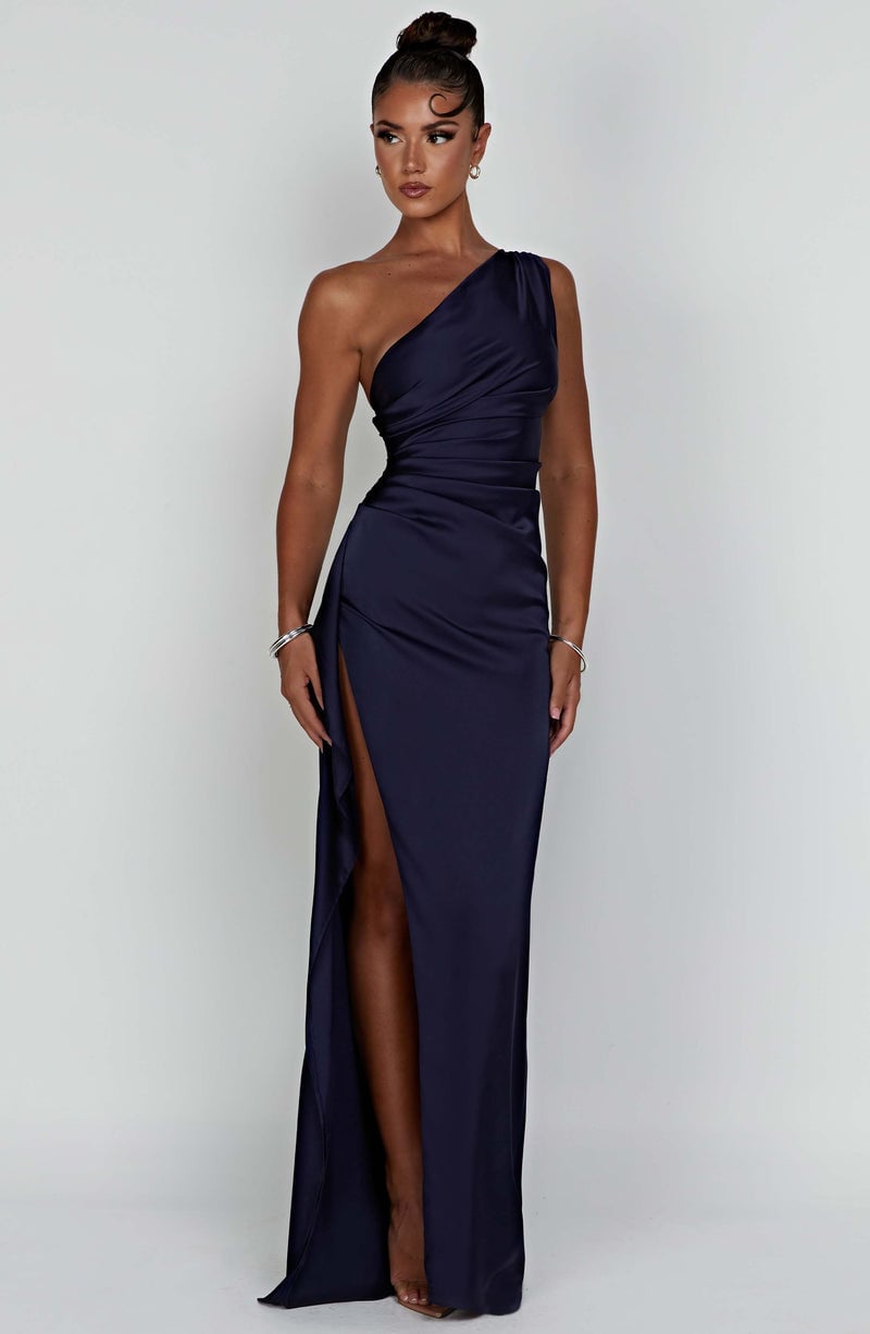 Side profile of the Celeste blush pink satin bodycon dress highlighting the ankle-length hem