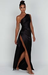 Close-up of the Celeste rust satin dress showing fabric texture and color