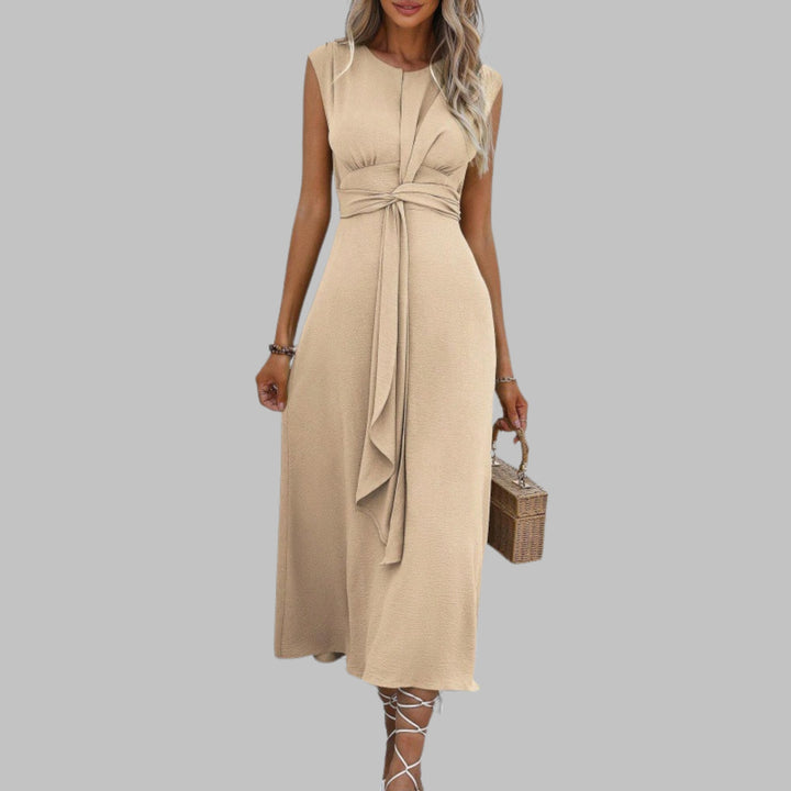 Full-length shot of the Celeste belted midi dress in yellow showing midi hem length