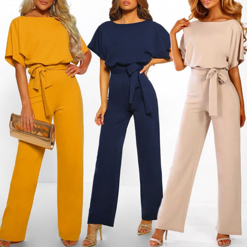 Close-up of the self-tie fabric waist belt on the Celeste jumpsuit in yellow