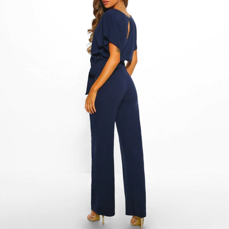 Full-length front view of the Celeste jumpsuit in soft nude beige with wide-leg trousers