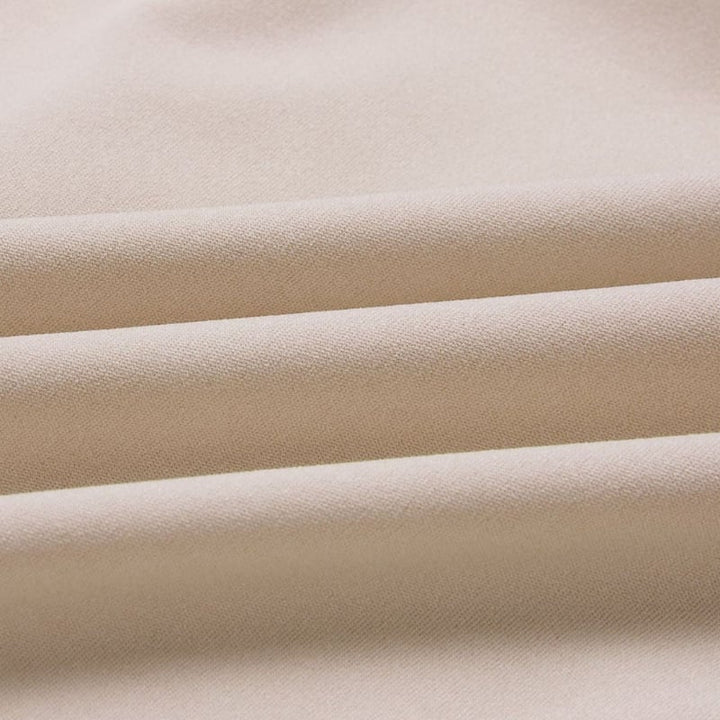 Back view of the Celeste belted wide-leg jumpsuit showing the clean, elegant silhouette