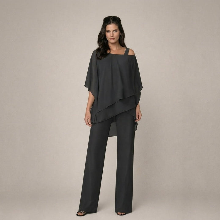 Front view of the Celeste black off shoulder wide leg pants set showing asymmetric draping detail