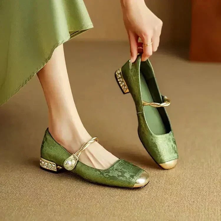 Celeste pearl strap mary jane shoes in sage green with glitter block heel and gold metallic square toe cap, front view