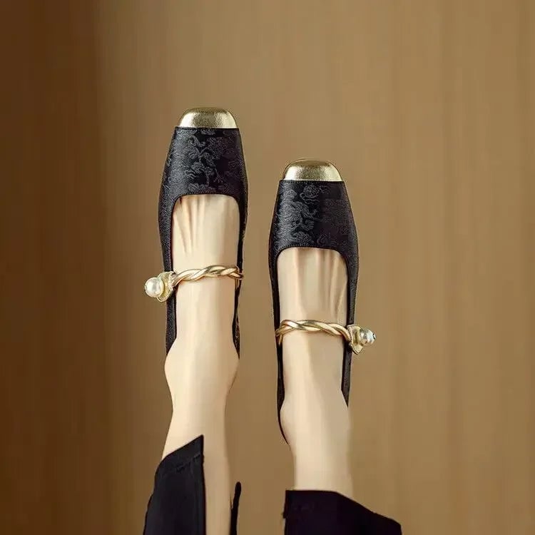 Celeste mary jane shoes in black from behind showing glitter block heel