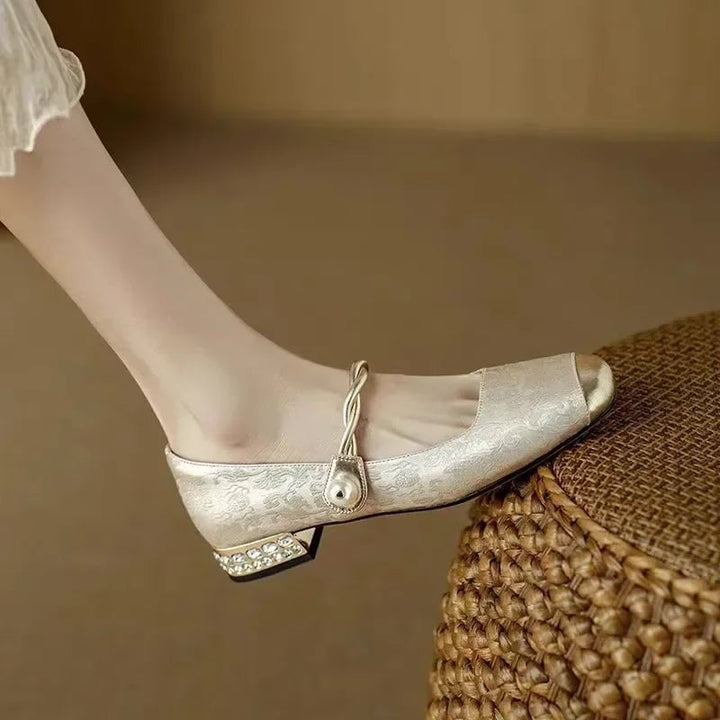 Celeste pearl strap mary jane shoes in beige, front view with gold metallic square toe cap