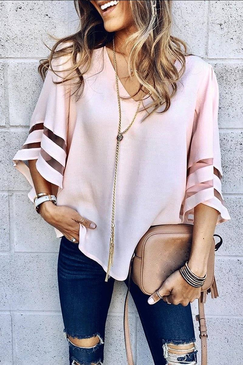 Celeste bell sleeve blouse in light pink, front view, showing the soft v-neckline and flared sleeves