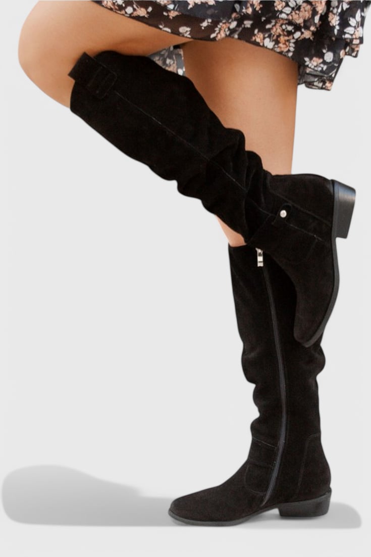 Close-up of cushioned insole and flexible sole on Florimay retro high boots