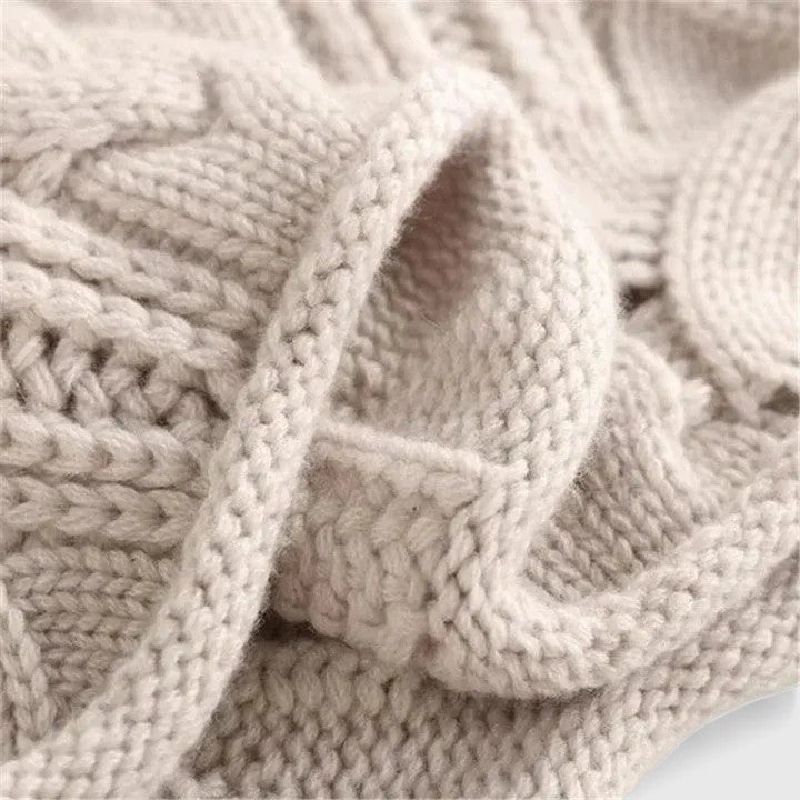 Side profile of the Charlotte elegant sweater showing relaxed drape and fit